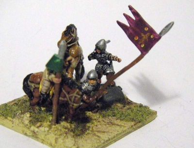 Norman General
one extra horseman added to what is sold as a mini diorama, complete with rock. Code :  VIK COM 8 - William II (William Rufis) 1087 – 1100 William standing on large rock pointing, sword in hand, Un-armoured groom hanging from William’s rearing horse (two piece casting), and AN 43(N) standard bearer (plus extra figure)
Keywords: Norman