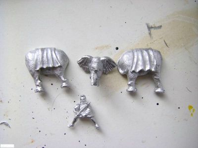 Unpainted Xyston carthaginian elephant with mahout
New castings from Xyston - review samples, photographed as received. The two halves of the smellie will need some filler and the head only has a shallow lug to fasten it to the body
Keywords: LCART ECART carthage hother