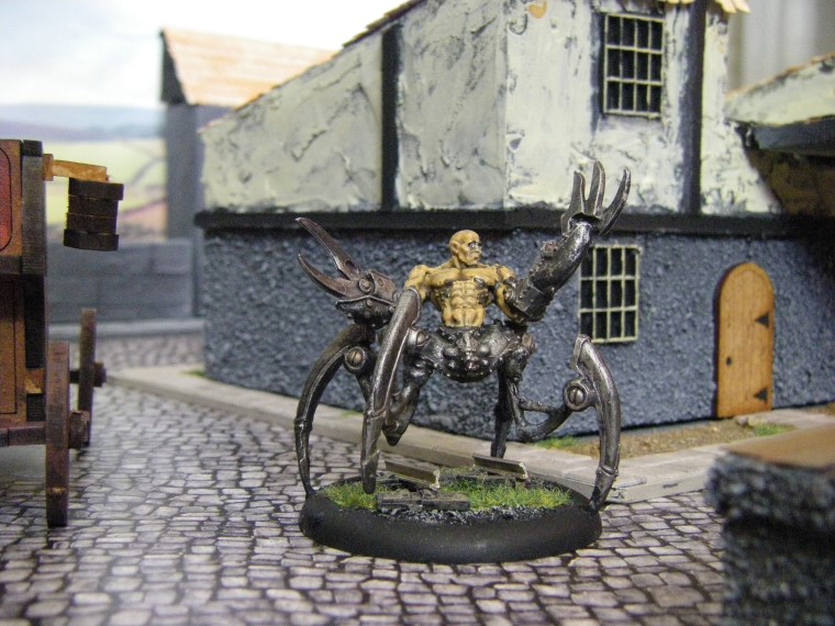  Photos of Howard Langston in some home made Malifaux City Terrain Painted, Wyrd Games