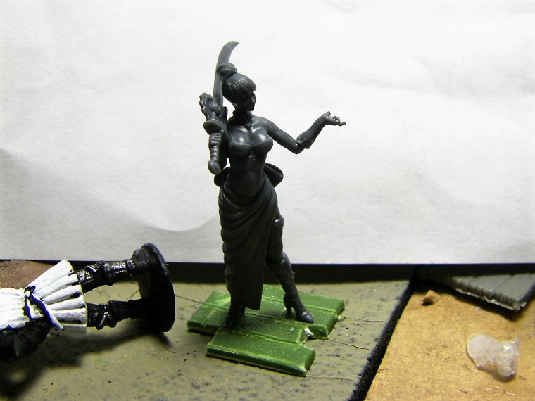 32mm Malifaux Wyrd Games Arcanist Cassandra being painted