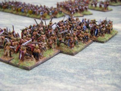 Gauls
Mixed figures, painted with a matt dark earth sprayed undercoat, and a final all-over wash of peaown ink 
Keywords: GALLIC