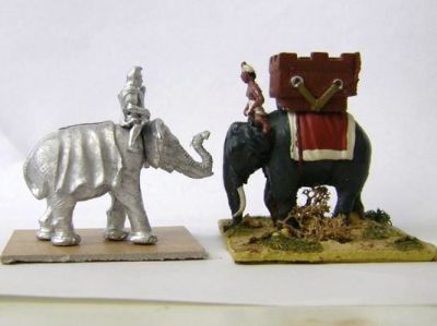Unpainted Xyston carthaginian elephant with Essex Elephant 
New castings from Xyston - review samples, photographed as received. Here compared with an Essex figures - this "carthaginian" elephant is slightly smaller, which is probably a good thing. The two halves of the Xyston smellie will need some filler and the head only has a shallow lug to fasten it to the body
Keywords: LCART ECART carthage numidian