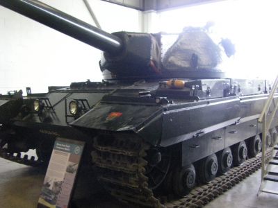 Conqueror
The FV 214 Conqueror, also known as "Tank, Heavy No. 1, 120 mm Gun, Conqueror" was a British heavy tank of the post-war era. It was developed as a response to the Soviet Joseph Stalin IS-3 heavy tanks and carried a larger 120 mm gun compared to the 20-pounder (83.4 mm) gun carried by its peer the Centurion. Its role was to provide long range anti-tank support for Centurion tanks. They were issued at nine for each regiment in Germany; usually grouped in three tank troops.
