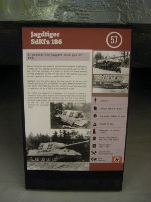 Jagdtiger serial number 305004
The Jagdtiger was the heaviest armored fighting vehicle operationally used during World War II. The vehicle carried a 128 mm PaK 44 L/55 main gun, capable of out-ranging and defeating any fielded Allied tank. It saw service in small numbers from late 1944 to the end of the war on both the Western and Eastern Front. Tiger ace Otto Carius commanded a company of Jagdtigers. His post-war memoir provides a rare combat history of the Jagdtigers which had been under his command. Although 150 were ordered, only between 77 to 88 were produced. Due to an excessive weight the Jagdtiger was continuously plagued with mechanical problems. Today, three Jagdtigers survive in museums.
