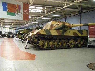 King Tiger "Porsche" Turret
Unlike in this one, the more common "production" turret, sometimes called the "Henschel" turret, was simplified with a significantly thicker flat face, no shot trap (created by the curved face of the initial-type turret), and less-steeply sloped sides, which prevented the need for a bulge for the commander's cupola
