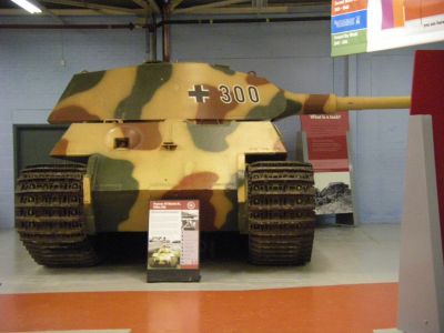 King Tiger 
The Tiger II combined the thick armor of the Tiger I with the sloped armor used on the Panther medium tank. The tank weighed almost seventy metric tons, was protected by 100 to 180 mm (3.9 to 7.1 in) of armor to the front, and was armed with the long barreled 8.8 cm Kampfwagenkanone 43 L/71 gun.
