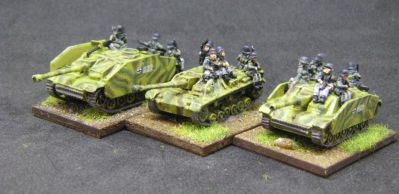 Stug Life
The larger one is the new multi-part Arrowhead kit. The smaller one is an older, single piece but now discontinued version. The one without schurzen is from Pendraken.  Tank riders are Arrowhead
Keywords: Compare