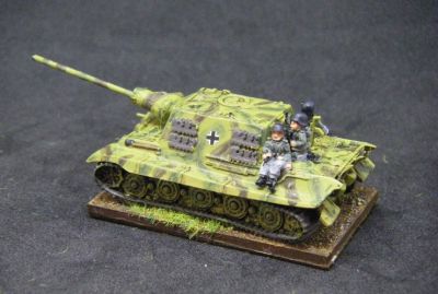 Jagdtiger
Sadly this model melted a bit when I dipped it in paint stripper, and I had to do a botch job repair of the barrel and mantlet The tank riders are from Arrowhead
