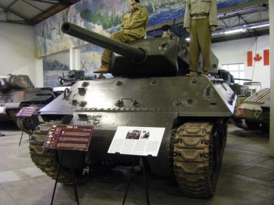 M10 Tank Destroyer
The first vehicle to establish the American style of World War II tank destroyer, the M10 was numerically the most important U.S. tank destroyer of World War II. It combined thin but sloped armor with the M4 Sherman's reliable hull and drivetrain, and a reasonably potent anti-tank weapon mounted in an open-topped turret
