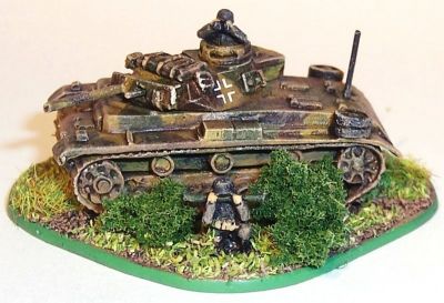 Forward Artillery Observer - front
A Panzerbeobachtungswagen (armoured artillery observer) using a converted Panzer III N, with the main gun replaced with a wooden dummy one, and extra radios added. The two figures are Pendraken.
Keywords: German PzBeobWagen PzIII Panzer III 