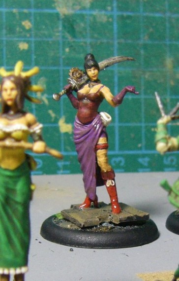 32mm Malifaux Wyrd Games Arcanist Colette Crew being painted